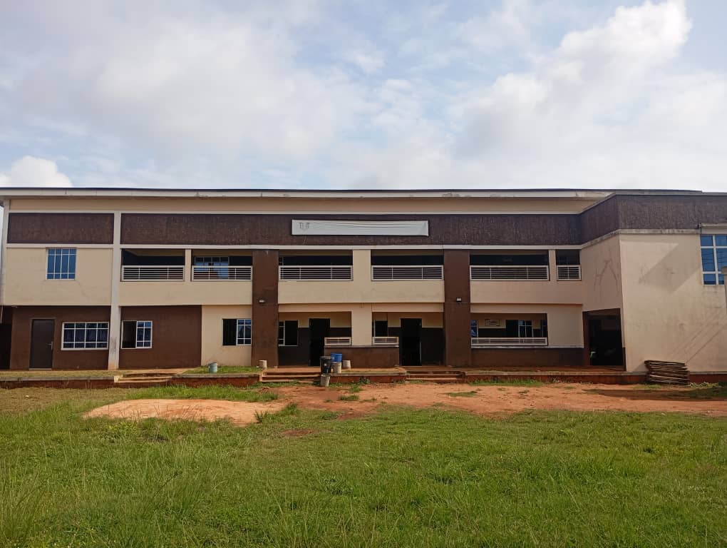 The Benedictine Academy campus building and students